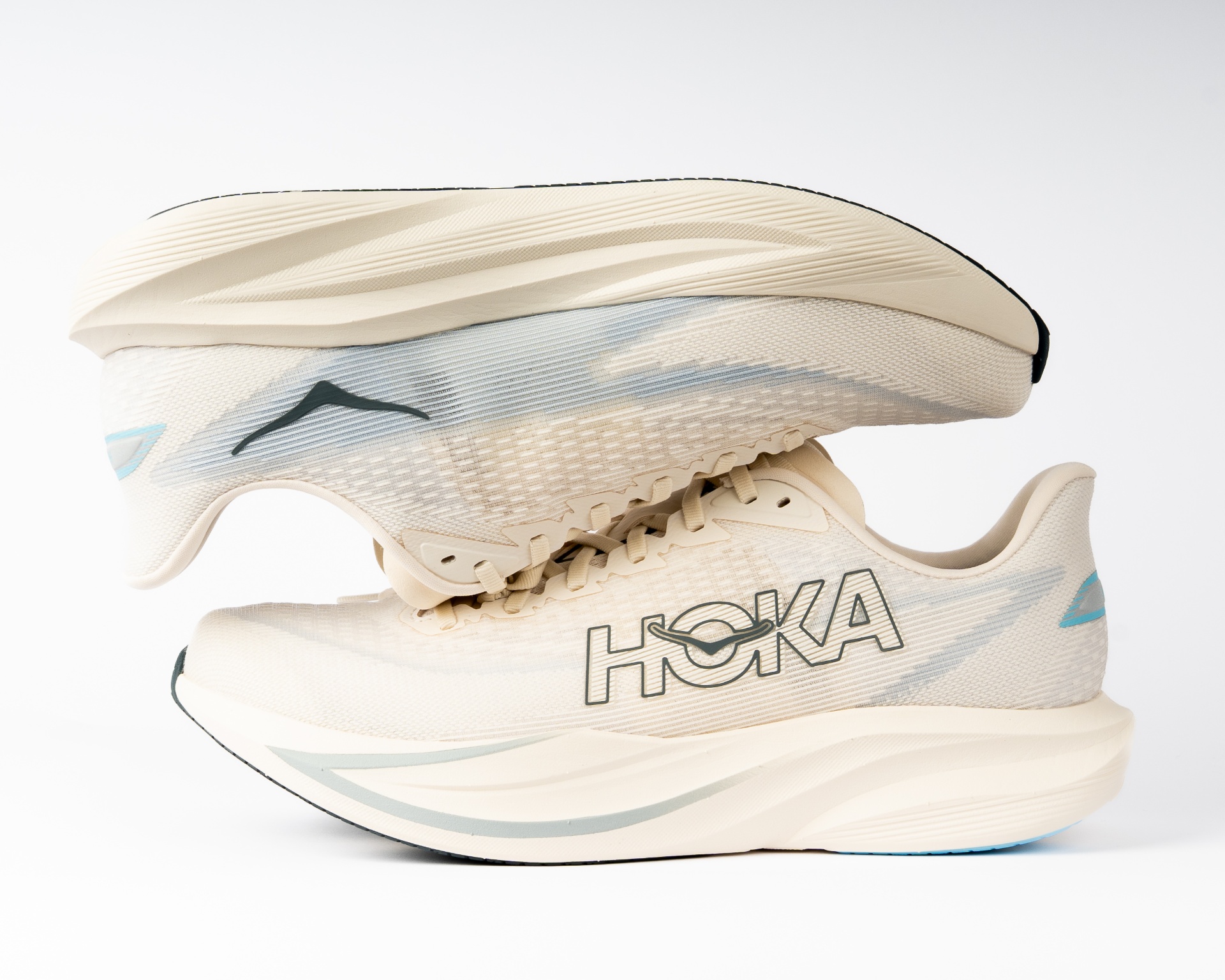 HOKA running shoes stacked on a clean backdrop